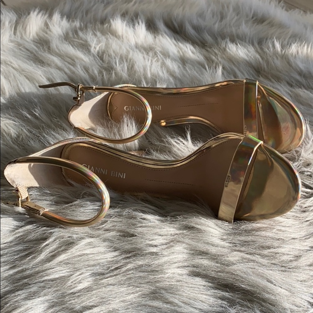 Gold strap heels.